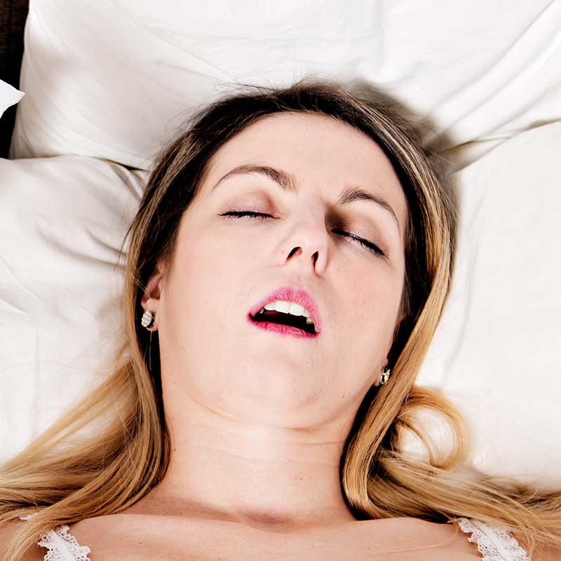 Woman snoring while she sleeps